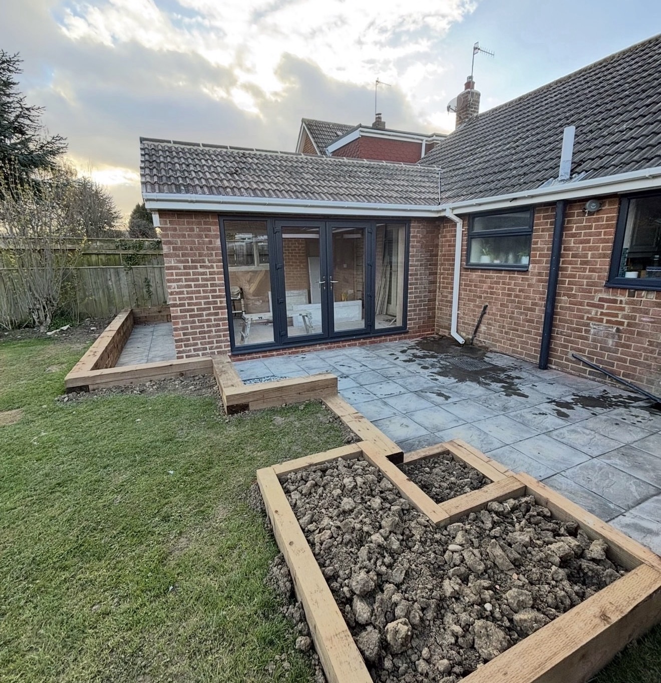 Newly built red brick extension on a North Yorkshire stone house